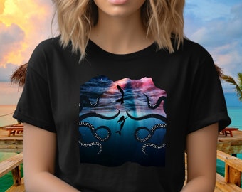 Mermaids and Monsters T-shirt shows mermaids swimming peacefully amid giant sea monster tentacles in a colorful design on a unisex Tee.