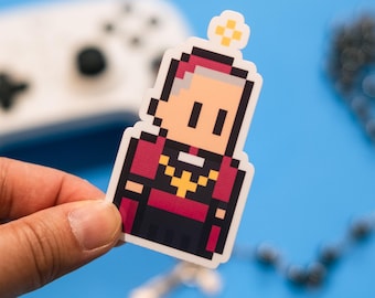 May include: A pixel art sticker of a cartoon bishop wearing a red and gold robe. The sticker is on a blue background.