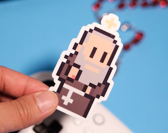 May include: A pixel art sticker of a cartoon character wearing a brown robe and a white halo. The character has a white beard and a light brown face. The sticker is on a blue background.