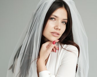Elbow length ivory wedding veil