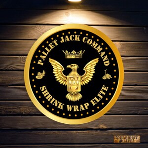 May include: A gold and black circular logo with the text "Pallet Jack Command Shrink Wrap Elite" around the edge. A gold eagle with a crown above it and the letters "PJ" on its chest is in the centre.