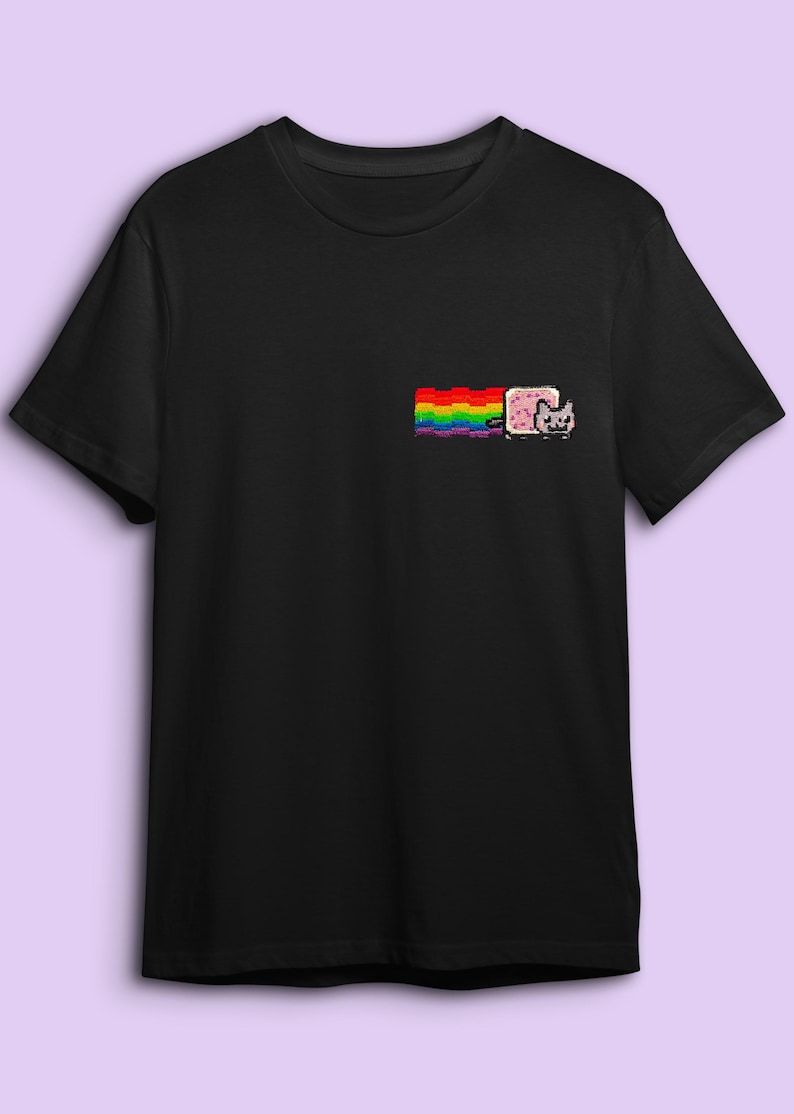 A black t-shirt with a colorful graphic design on the front, including a rainbow and a cat.