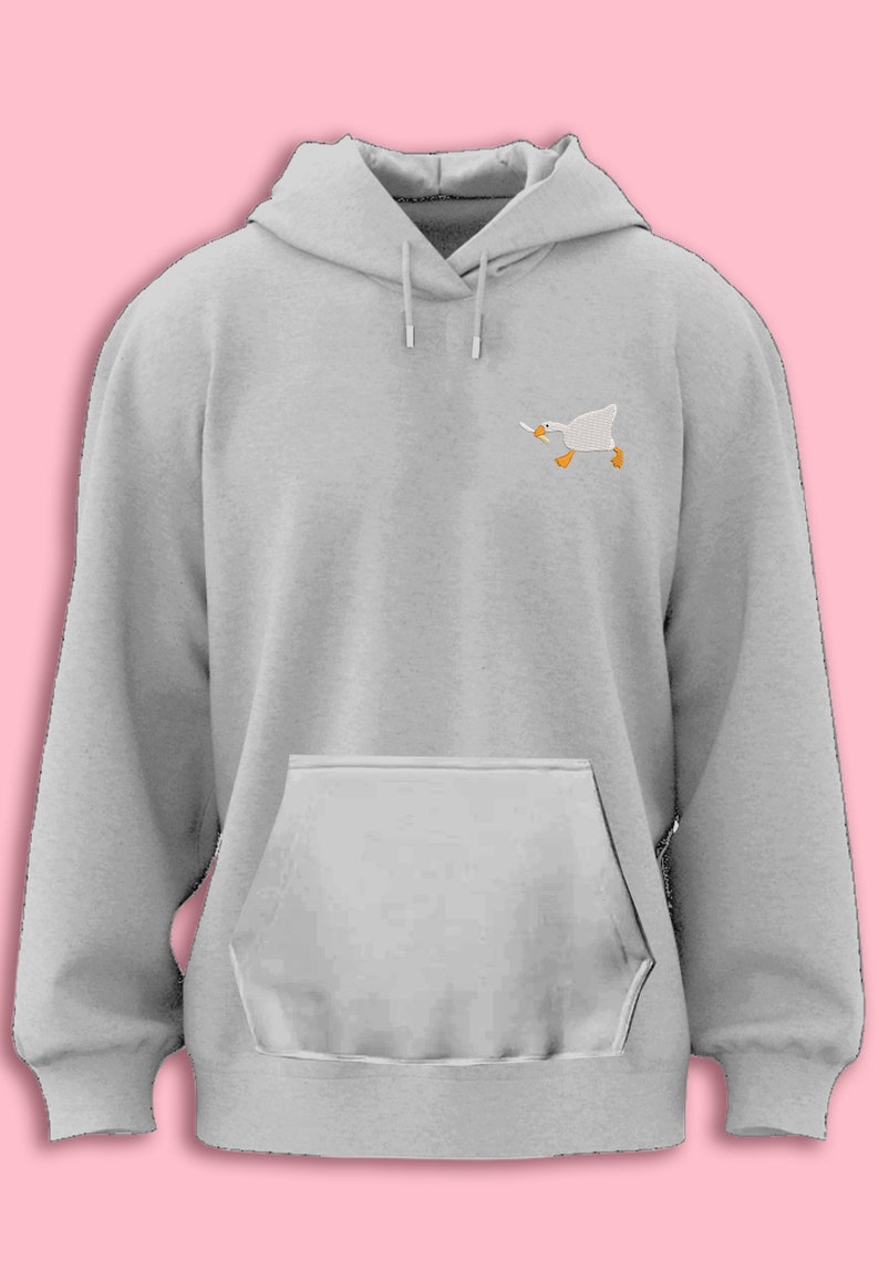 May include: A gray hooded sweatshirt with a small embroidered image of a white goose holding a knife in its beak.