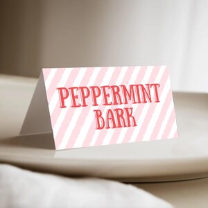 May include: Pink and white striped card with the text "Peppermint Bark" in red.