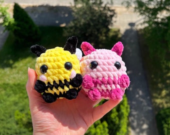 Süßer Bonbon-Oktopus Amigurumi, rosa, weiß und grün