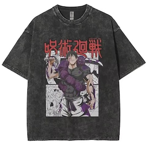 May include: Dark gray t-shirt featuring a manga-style illustration of a muscular character with a sword and purple accents. The Japanese text is in red. The shirt has a vintage, washed appearance.