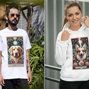 May include: White t-shirt and hoodie featuring illustrations of dogs with the text "The Golden Retriever" and "The Welsh Corgi" on them.