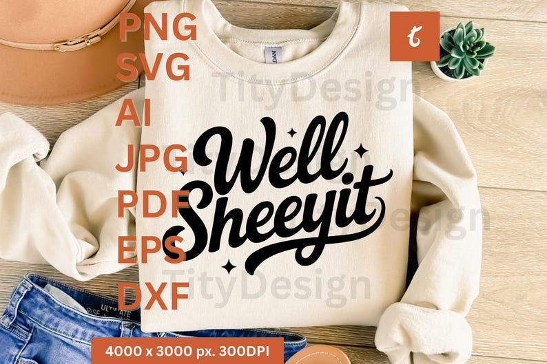 Beige sweatshirt with black “Well Sheeyit” script and sparkles, displayed with hat and jeans, text listing file formats.