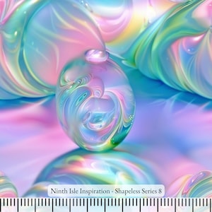 May include: A close-up of a iridescent, multi-colored, glass orb with a swirling pattern. The orb is resting on a pink and blue background with the text "Ninth Isle Inspiration - Shapeless Series 8".