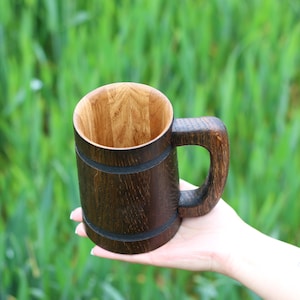 Close-up of natural wood texture on handcrafted mug