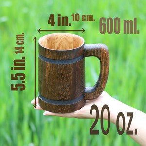 Wooden tankard with smooth interior and sturdy handle.