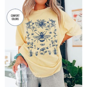 Comfort Colors Wildflower Bee Shirt, Botanical Garden Tee, Pollinator Gift, Cottagecore Floral Top, Bee Lover Nature T-Shirt, gift for women