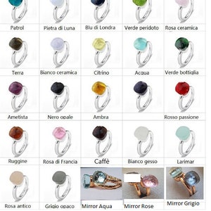 Puede incluir: Un juego de tres tazas de cer&aacute;mica con un esmalte moteado de color crema. Cada taza presenta un dise&ntilde;o pintado a mano diferente: una hoja azul y verde, una flor amarilla y una baya roja. Las tazas tienen un dise&ntilde;o simple y moderno.