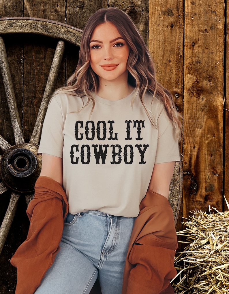 cool it cowboy western theme cowgirl t-shirt in tan with black print in a western style font