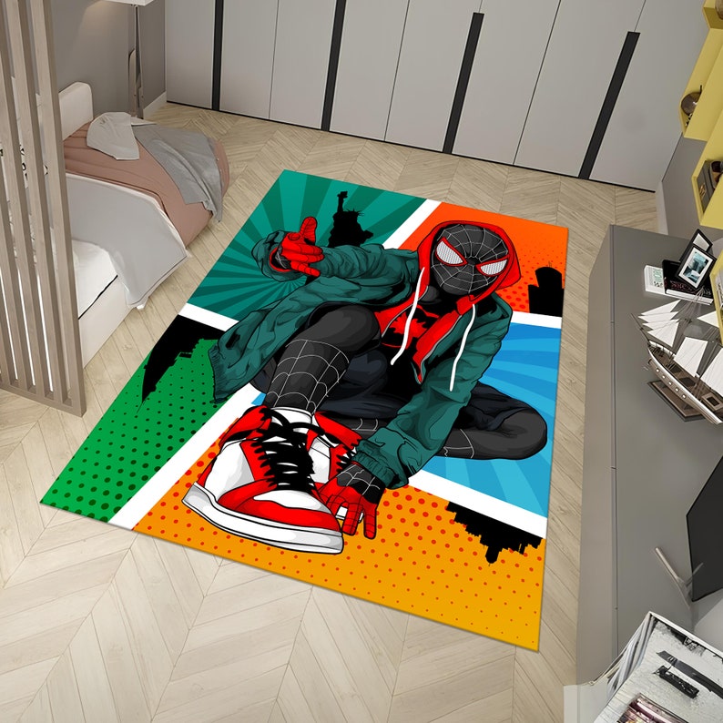 May include: A colorful rug featuring a cartoon superhero wearing a red and black suit and a green hoodie. The superhero is posed in a dynamic action pose with one leg extended and the other bent. The rug has a comic book style design with red, yellow, blue, and green colors.