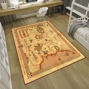 May include: A vintage-style map rug featuring a detailed illustration of the fictional land of "Harad" from the Lord of the Rings. The rug is beige with brown and red accents and has a decorative border.