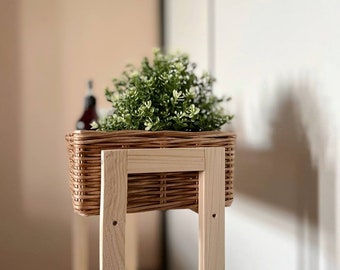 Long wicker basket. Brown storage basket. Rectangular basket.