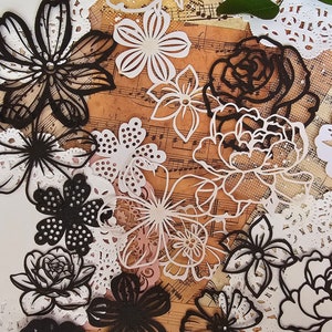 Mélange de pequenas flores impressas em relevo para a redação de um jornal | Álbum de recortes | Artesão | Artes da principal •