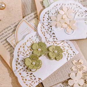 Mélange de pequenas flores impressas em relevo para a redação de um jornal | Álbum de recortes | Artesão | Artes da principal •