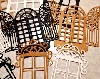Puede incluir: Surtido de recortes decorativos de ventanas en varios tamaños y estilos. Los recortes están hechos de papel y presentan diseños intrincados, que incluyen partes superiores arqueadas, marcos ornamentados y múltiples paneles. Los colores incluyen blanco, negro y marrón.