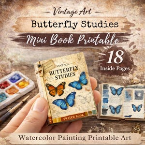 May include: A miniature book titled "Butterfly Studies" with a vintage aesthetic, featuring illustrations of butterflies. The book is held in a hand, with a watercolor palette and brushes visible. The text reads "Mini Book Printable" and "Watercolor Painting Printable Art".