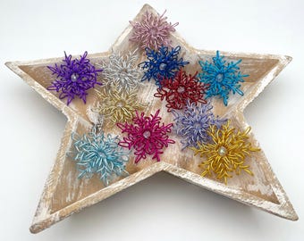 Ice star Christmas decoration with cut glass bead