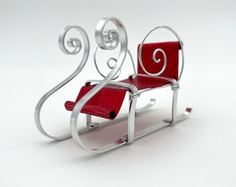 Sleigh Christmas decoration, color red-silver