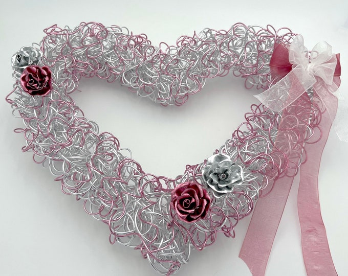 Featured listing image: Heart-shaped door wreath, silver and pink in color