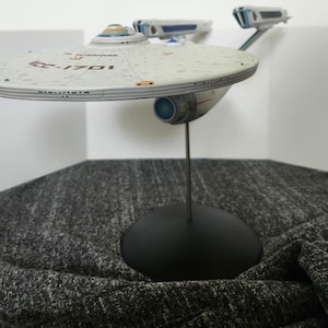 Enterprise Refit 1701 nearly 22 inches long fully finished and assembled ready for display. UnLit version,for lighting please contact us.