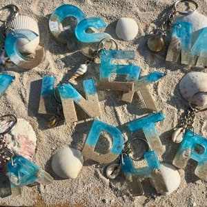 Gepersonaliseerde sleutelhanger van hars, sleutelhanger strandzand en schelp, aangepaste tasbedel