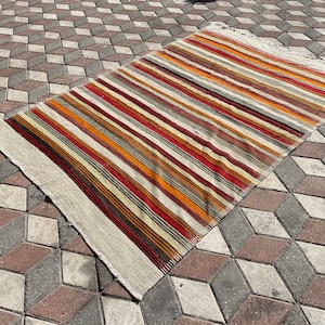 Orange gestreifter Kelim Teppich: Anatolischer Teppich aus Wolle (15 x 23 cm)