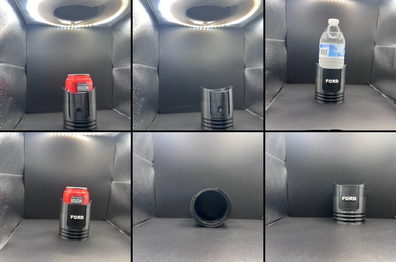 Pode incluir: Um porta-copos preto com a palavra "FORD" impressa nele. O porta-copos &eacute; mostrado com uma lata de refrigerante, uma garrafa de &aacute;gua e vazio.