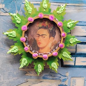 Liten eldboll Frida-magnet