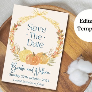 May include: Save the date card with a watercolor wreath of fall leaves, wheat, and pumpkins. The text reads "Save the Date" with the names "Brooke and Nathan" and the date "Sunday 27th October 2024".