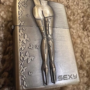 Vintage lighter - Beautiful lady on high heels