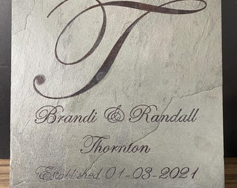laser enrgaved 11.75 X 11.75 slate tile, come with wooden stand.