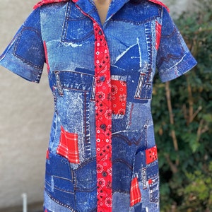 May include: A blue and red short-sleeved button-up shirt with a patchwork design featuring denim and red bandana print.