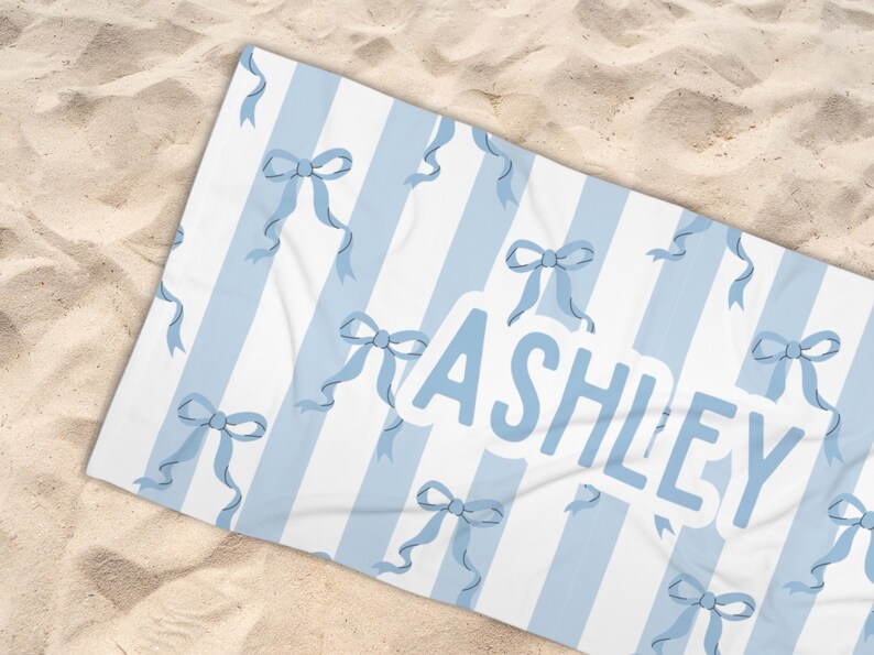 Custom name coquette bow beach towel in a stylish design, perfect for girls, teens, and kids. A personalized pool towel ideal for spring break, vacations, and bachelorette gifts. This trendy custom color towel makes a great gift idea for any occasion.