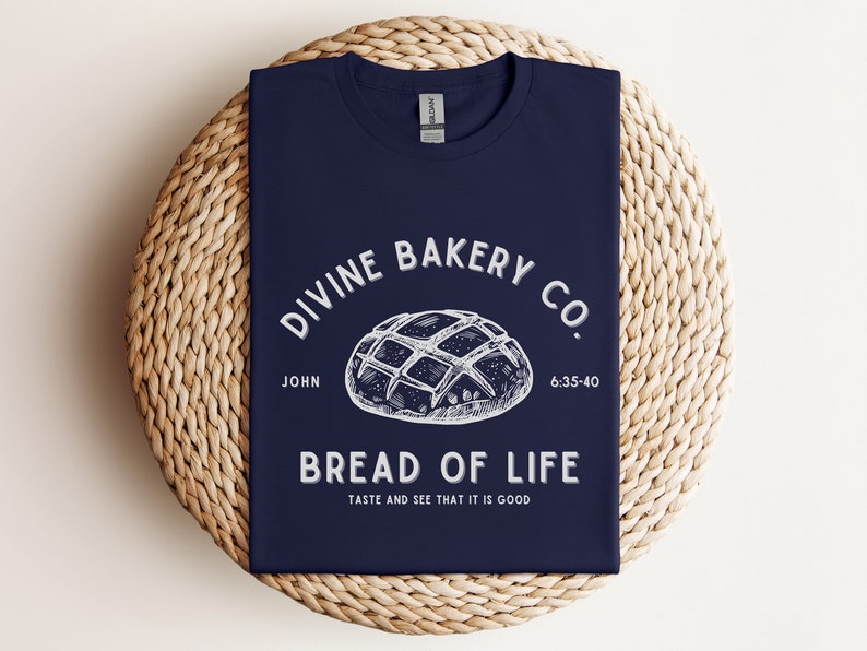 Faith-based sourdough t-shirt with a Bible verse, perfect for a birthday gift for her or a sourdough-themed gift for a friend. This Christian baking shirt is a great sourdough gift for bread lovers who enjoy faith-inspired apparel and scripture-based designs.