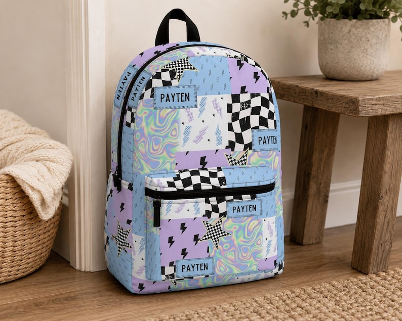 Pastel checkered backpack featuring a customizable name and modern colorful design. Durable everyday bag perfect for school, travel, sleepovers, and extracurricular activities. Comfortable backpack for kids and teens who love trendy, personalized accessories.