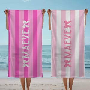 This custom coquette bow beach towel is the perfect blend of style and function for kids and teens. Designed with a personalized name and trendy bow detail, this custom pool towel makes a great vacation towel gift or summer accessory. Soft and absorbent, it’s ideal for beach days, poolside lounging, and travel, making it a fun and unique gift idea for girls!