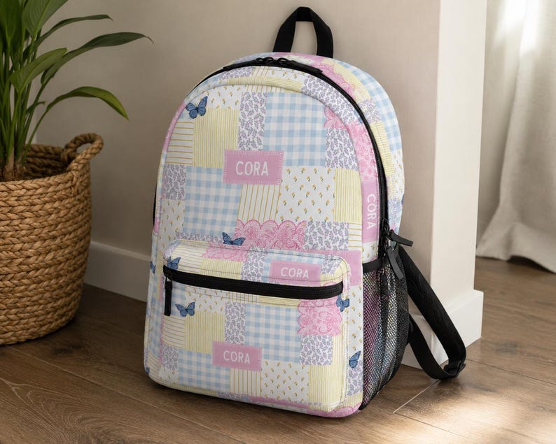 Patchwork style backpack featuring soft pastel patterns and customizable name detail. Durable everyday bag perfect for school, travel, sleepovers, and daily adventures. Trendy design for kids and teens who love colorful, feminine, vintage inspired accessories.