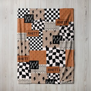 Boy baby blanket with custom name and lightning bolt design, perfect for boy nursery decor or as a cool kids blanket. This personalized baby blanket makes a thoughtful baby shower gift for boys and adds a fun, modern vibe to any nursery. Soft, stylish, and unique for newborns or toddlers.