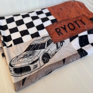 Racing Blanket Custom Name Blanket featuring a bold race car design with personalized name detail. This Personalized Race Car Gift Idea Toddler Boy Gift works as custom bedding gift and statement racing room decor. Perfect for car-loving kids and teens, this cozy blanket makes a thoughtful Teen Boy Gift Idea for birthdays, holidays, or special occasions while adding fun racing style to a boy bedroom.