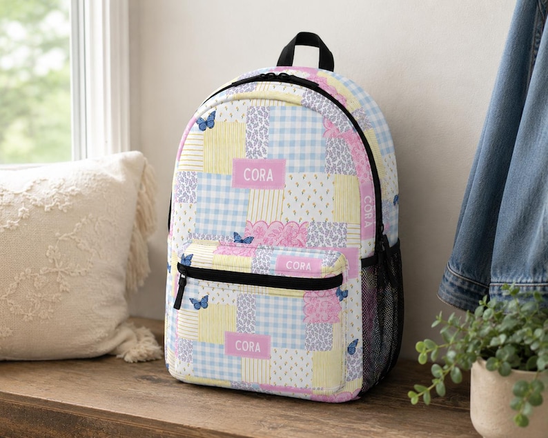 Patchwork style backpack featuring soft pastel patterns and customizable name detail. Durable everyday bag perfect for school, travel, sleepovers, and daily adventures. Trendy design for kids and teens who love colorful, feminine, vintage inspired accessories.
