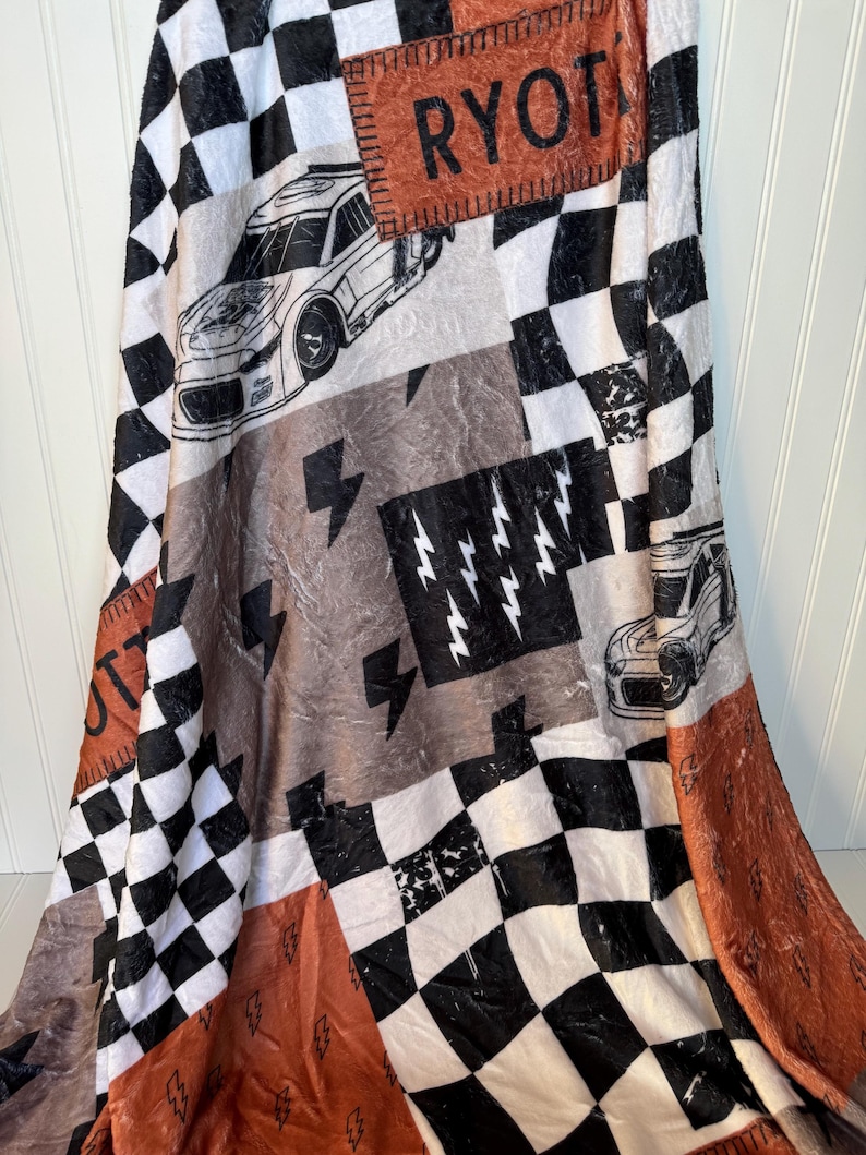 Racing Blanket Custom Name Blanket featuring a bold race car design with personalized name detail. This Personalized Race Car Gift Idea Toddler Boy Gift works as custom bedding gift and statement racing room decor. Perfect for car-loving kids and teens, this cozy blanket makes a thoughtful Teen Boy Gift Idea for birthdays, holidays, or special occasions while adding fun racing style to a boy bedroom.
