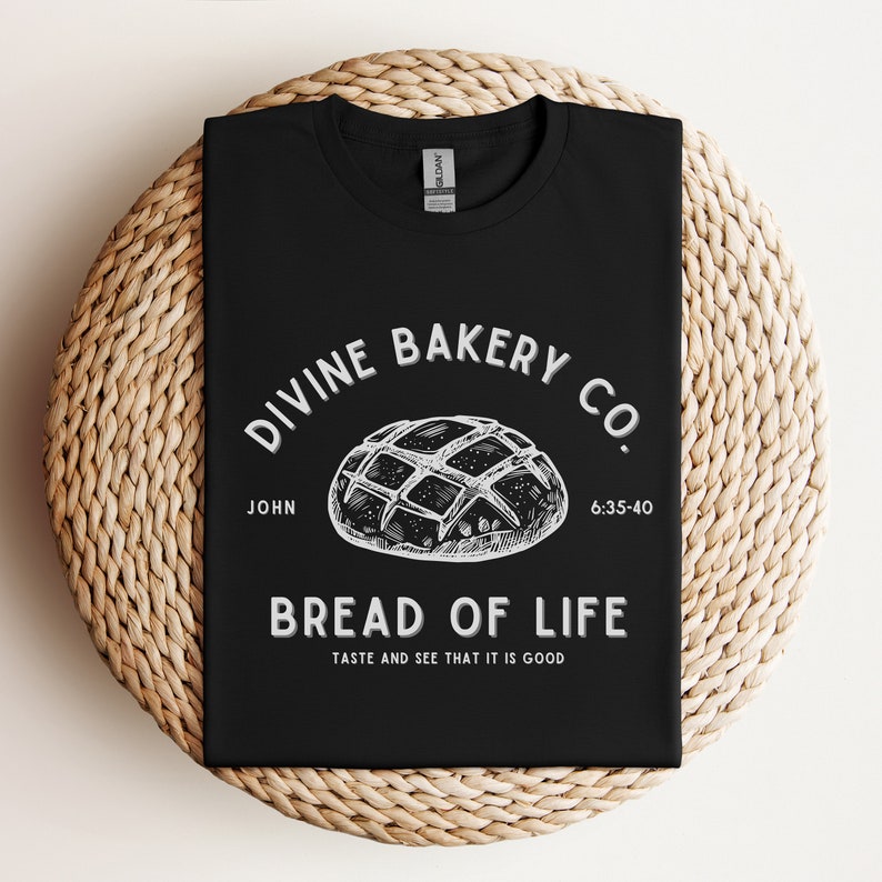 Faith-based sourdough t-shirt with a Bible verse, perfect for a birthday gift for her or a sourdough-themed gift for a friend. This Christian baking shirt is a great sourdough gift for bread lovers who enjoy faith-inspired apparel and scripture-based designs.