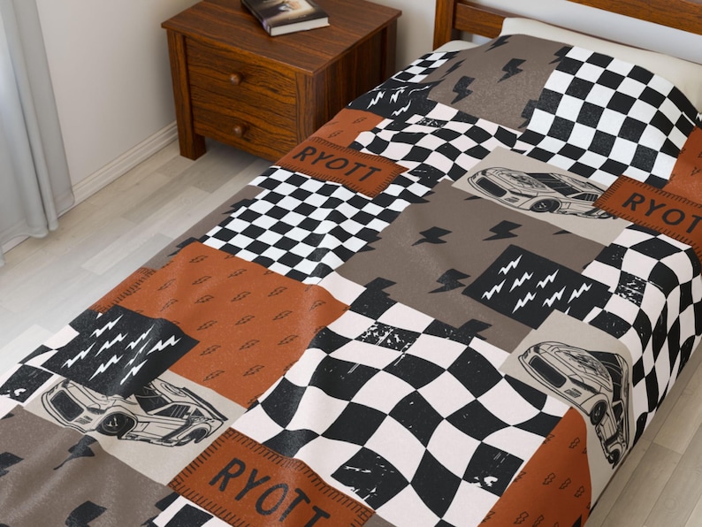 Racing Blanket Custom Name Blanket featuring a bold race car design with personalized name detail. This Personalized Race Car Gift Idea Toddler Boy Gift works as custom bedding gift and statement racing room decor. Perfect for car-loving kids and teens, this cozy blanket makes a thoughtful Teen Boy Gift Idea for birthdays, holidays, or special occasions while adding fun racing style to a boy bedroom.