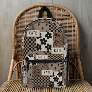 Custom girl backpack with leopard checkered print, personalized with name for a unique touch. This girl name backpack is a fun teen gift idea, perfect for back to school or everyday use. Personalized kids backpack with cheetah design for stylish school bag flair. Great for students who love animal prints.