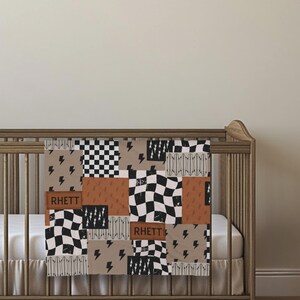Boy baby blanket with custom name and lightning bolt design, perfect for boy nursery decor or as a cool kids blanket. This personalized baby blanket makes a thoughtful baby shower gift for boys and adds a fun, modern vibe to any nursery. Soft, stylish, and unique for newborns or toddlers.